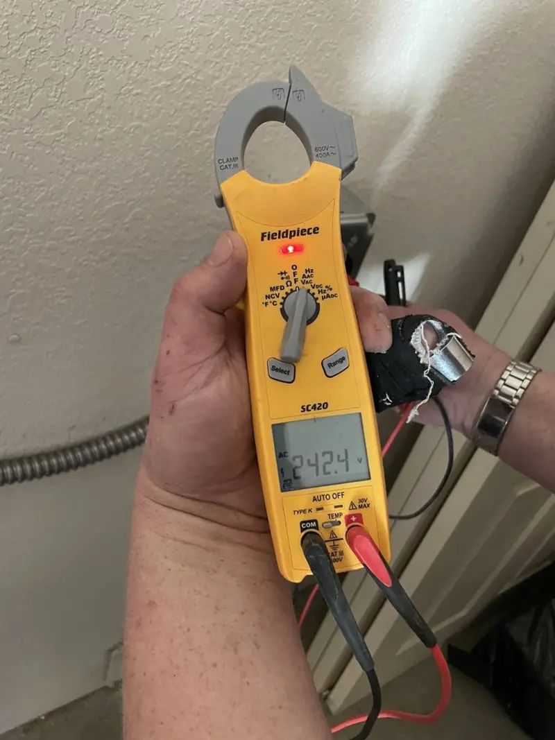 Voltage testing with clamp meter during Circuit Breaker Repair in New Hope